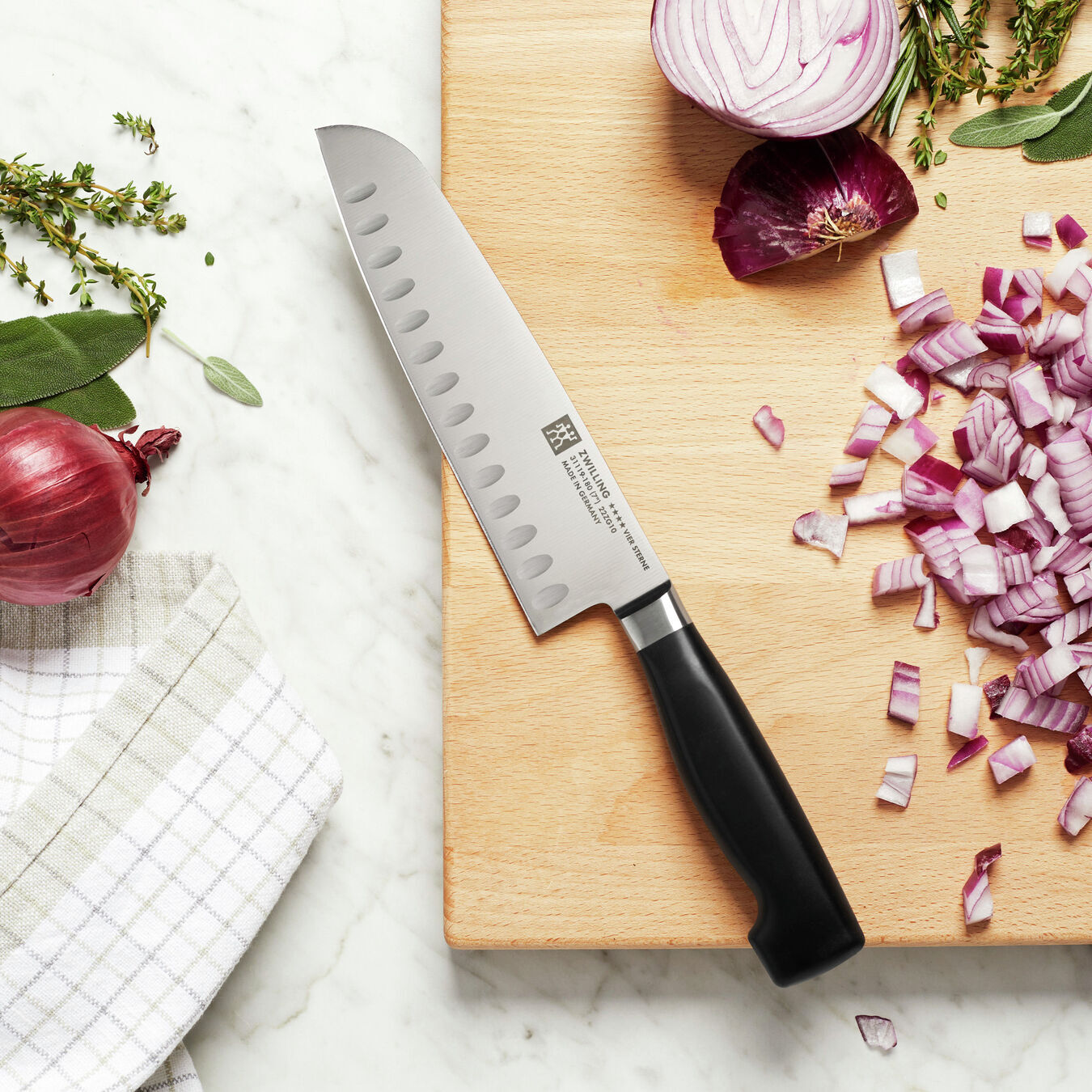 Zwilling Four Star Santoku knife with cutter 18 cm, 31119-181